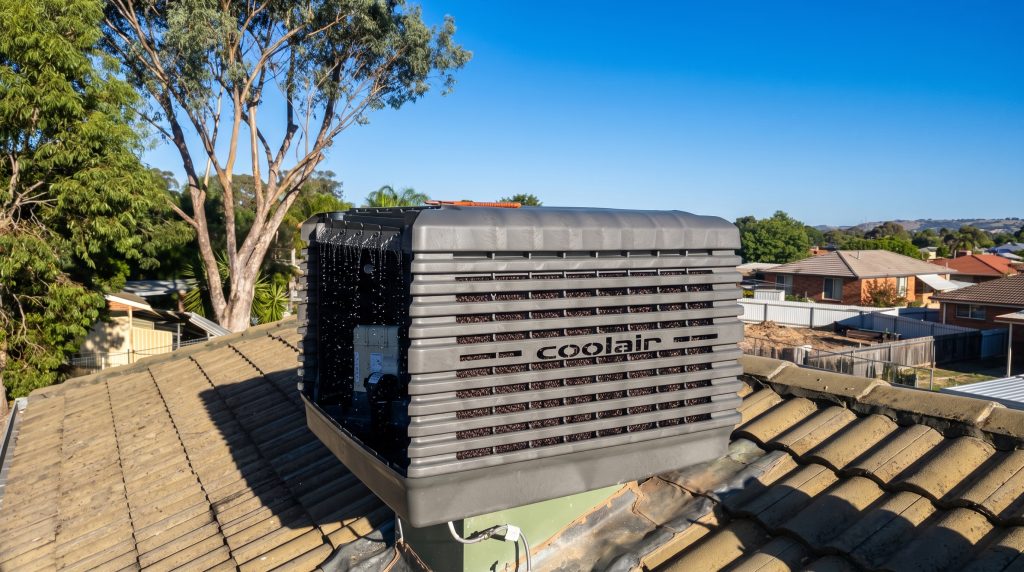 Evaporative air conditioner on a tiled roof